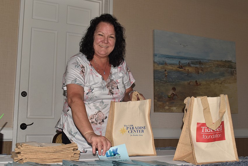 Celia Moore filled goody bags for attendees.