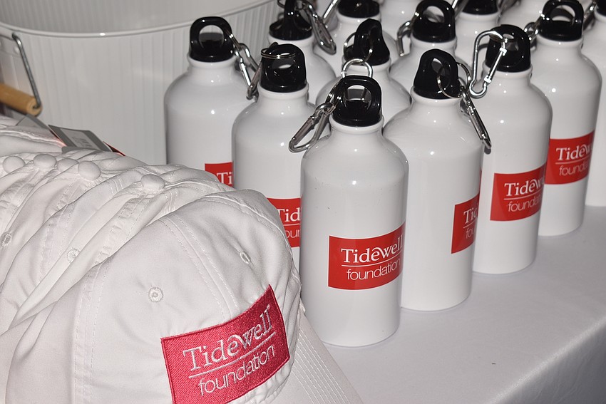 Tidewell Foundation had branded hats and bottles for attendees.