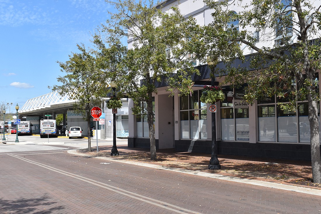 The property at 22 Lemon Ave. is immediately adjacent to the Sarasota County Area Transit bus depot.