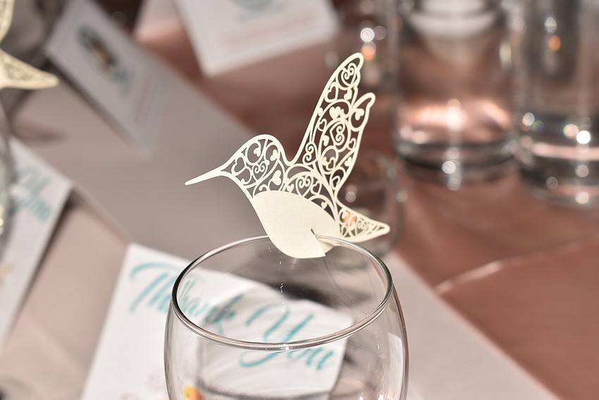 Delicate birds decorated the glasses.