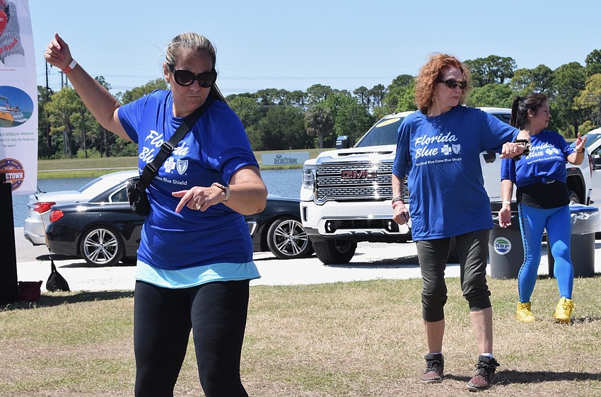 Francie Pages, Penny Savage and Quyen Dang demonstrate a Florida Blue zumba class.