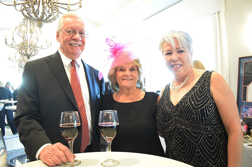 Concession's Bob and Zita Grepling and Country Club East's Theodora Stern look forward to a big night at Tropical Nights — A Royal Affair.