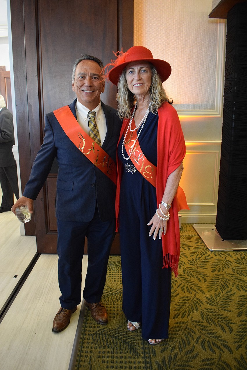 Nikomis' Jaime and Julie DiDomenico complete their British royalty look with sashes.