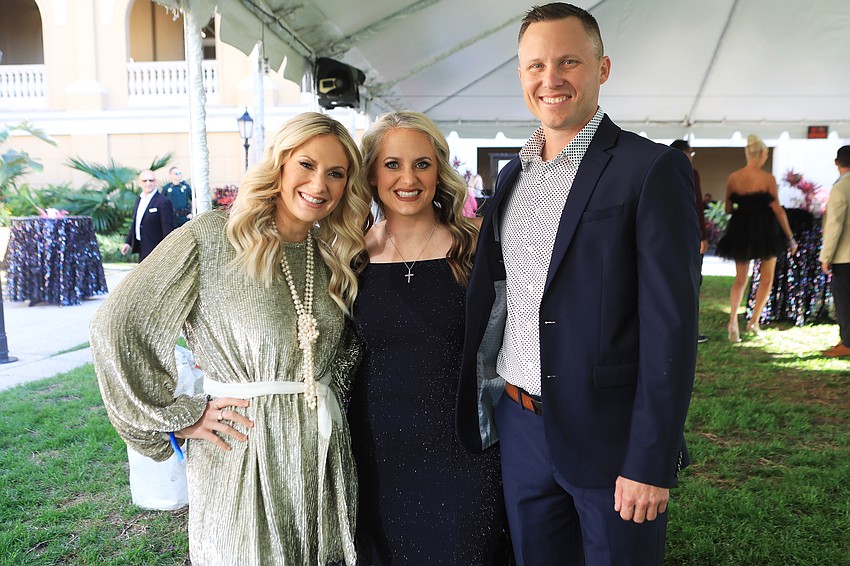 Alicia Robinson with Amber and Josh Clements