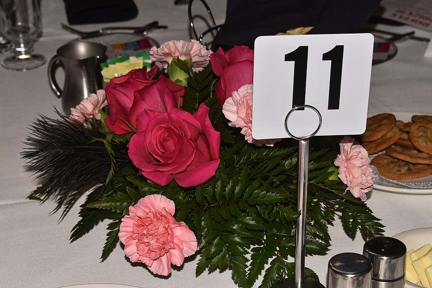 The tables were decorated with a centerpiece.