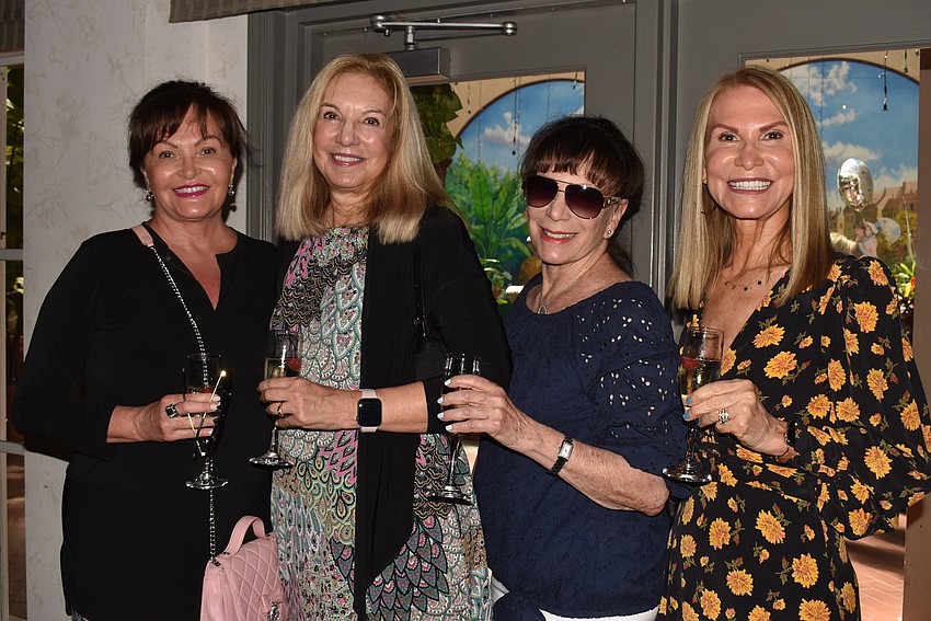 Cris Meyers, Donna Pettinato, Lynn Walters and Debby Rosenfield stepped into the ballroom.