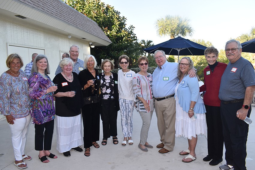 Original and second generation owners gathered for a photo.
