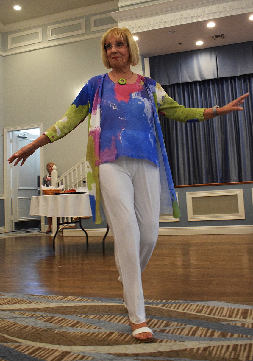Cascades' Ann King twirls around to show her entire outfit.