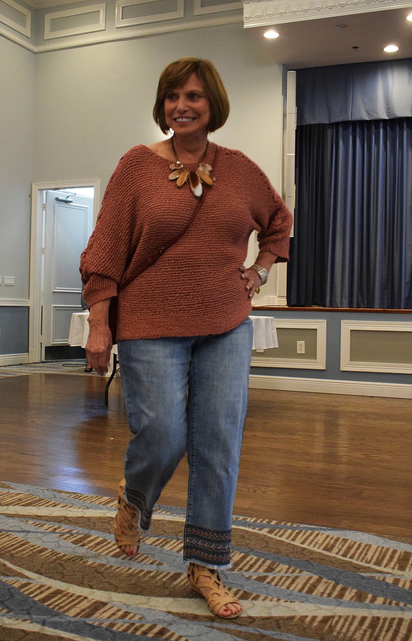 Cascades' Marsha Bloomfield struts down the runway in casual wear.