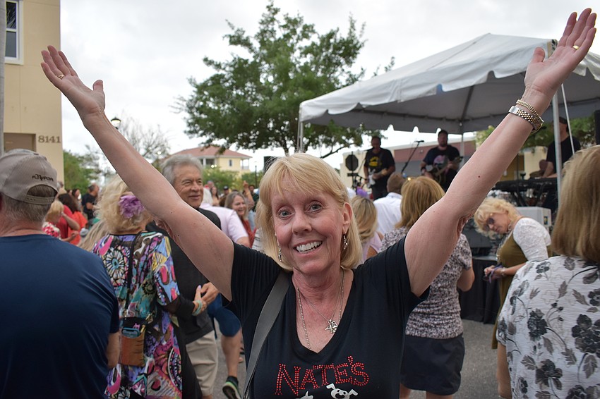 Sarasota's LouAnn O'Callaghan obviously is enjoying Music on Main.