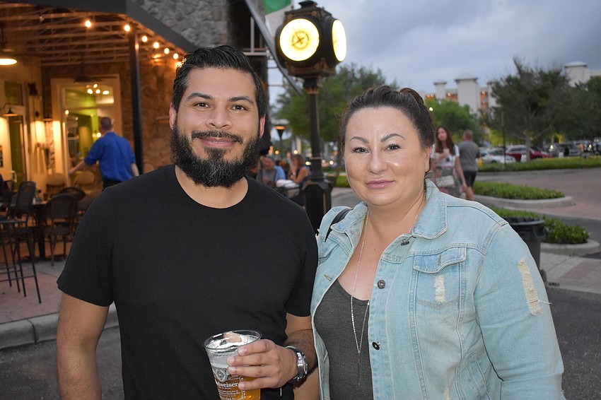 Keller Williams coworkers Luis Piamba and Michelle Costa enjoy 