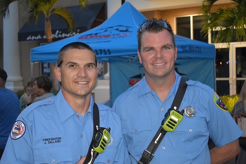 Firefighter Jacob Dillard and Engineer Daniel Lane of the East Manatee Fire Rescue keep watch at the event.