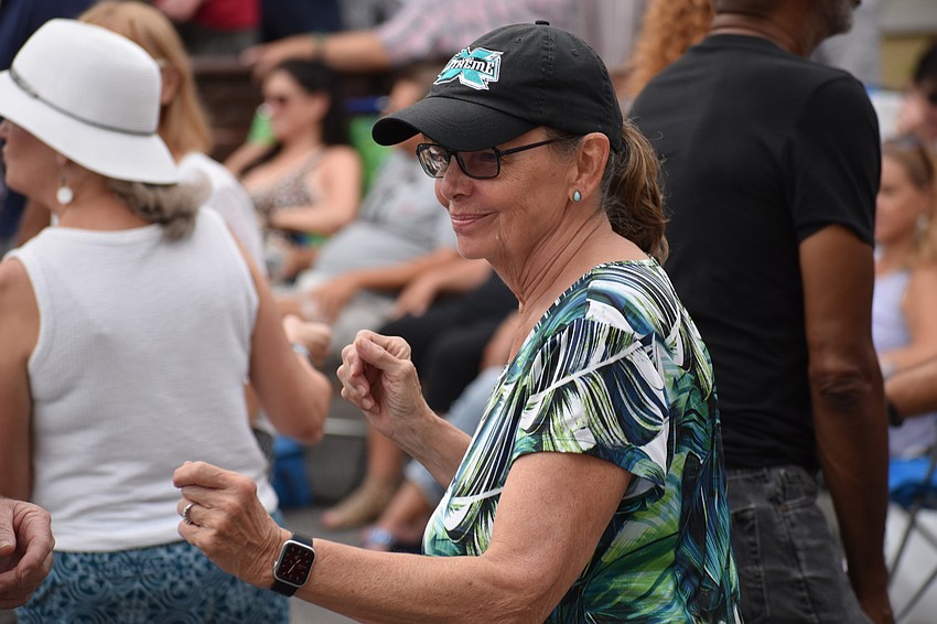 Lakewood Ranch's Charleen Race shows her dance moves on Lakewood Main Street.