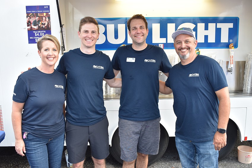 Lorraine Rodgers, Devin Dash, Dan Sidler and Tony Dahlin of the Lakewood Ranch Business Alliance worked as bartenders for the night.