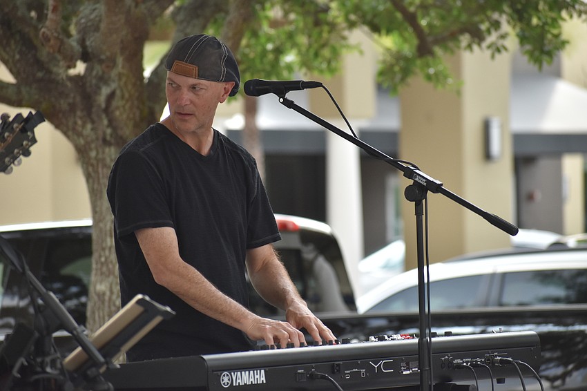 Todd Adams plays keyboard for Kettle of Fish.