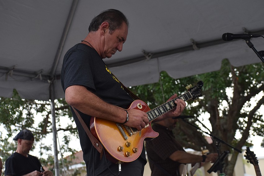 Greg Polous is the guitarist for Kettle of Fish.