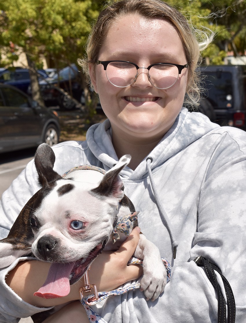 Faith Chaney with Nova, a Boston terrier.