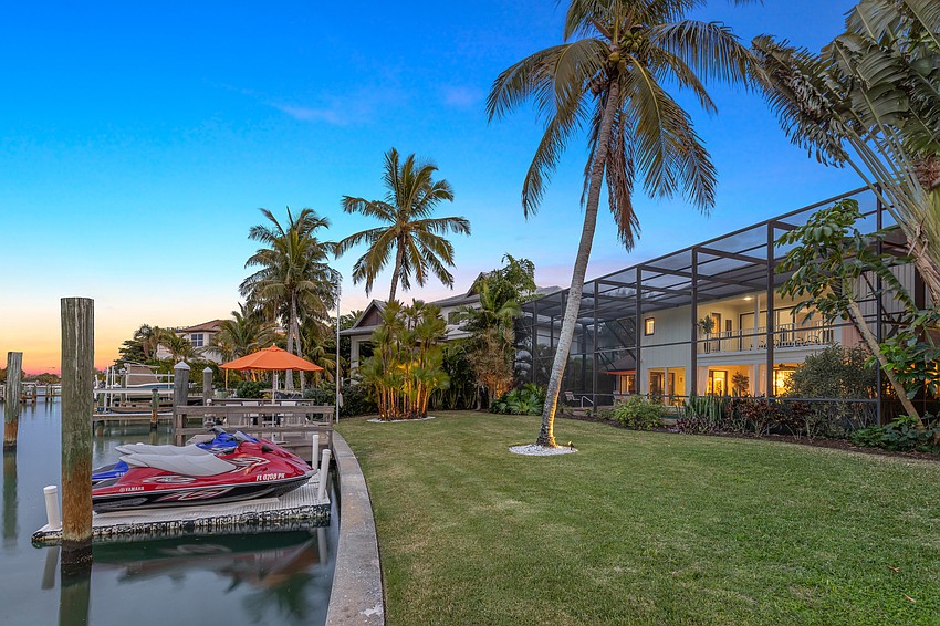 The canalfront property offers a pair of personal watercraft lifts on a deepwater canal near the north bridge.