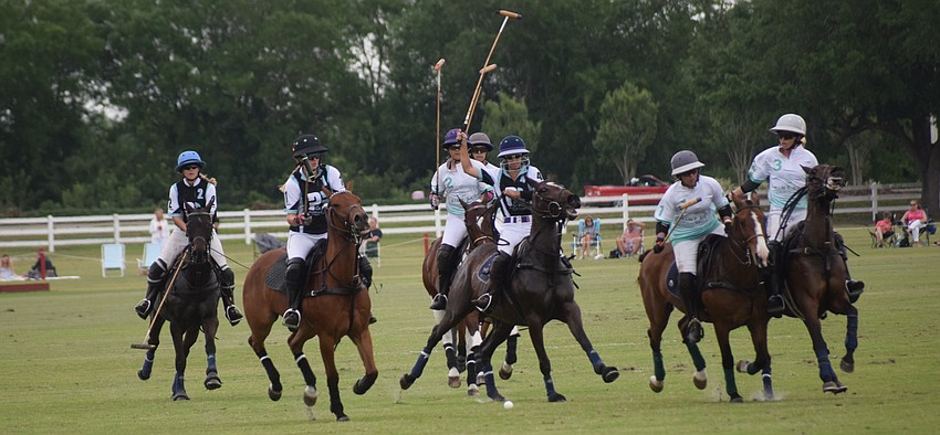 Ocala's Lauren Proctor-Brown leads a calvary charge of players toward the ball in the Women's Challenge title game.
