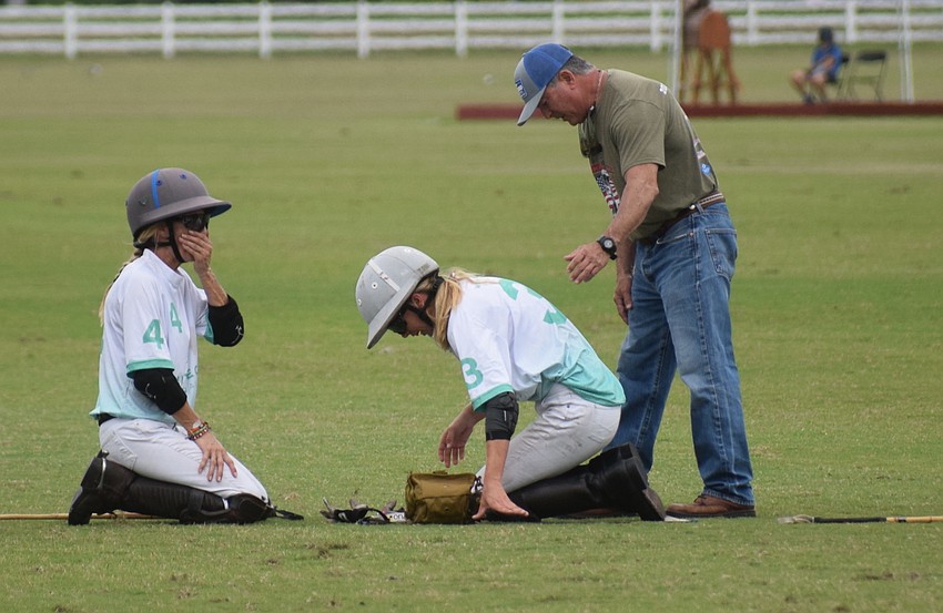 Power Group's Cecelia Cochran obviously is worried about Kylie Sheehan, who hurt her back in a collision between horses. Sheehan continued riding, though.