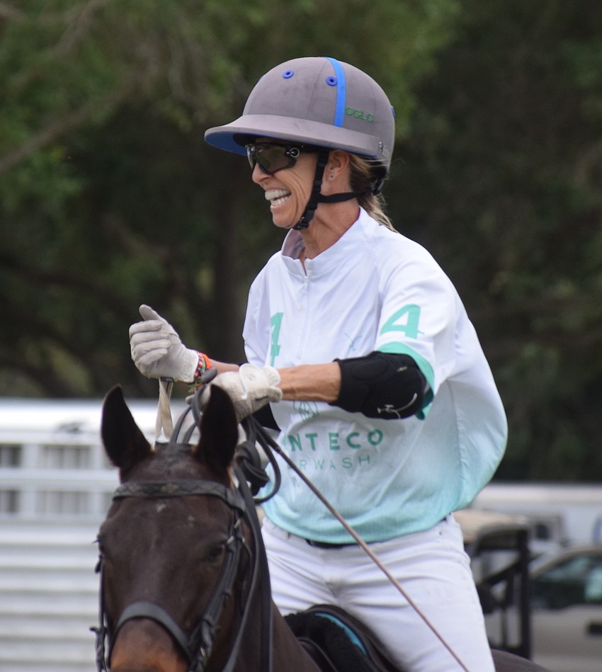 Power Group's Cecelia Cochran is enjoying the moment during the Women's Challenge, which her team won 6-5 over Ocala.