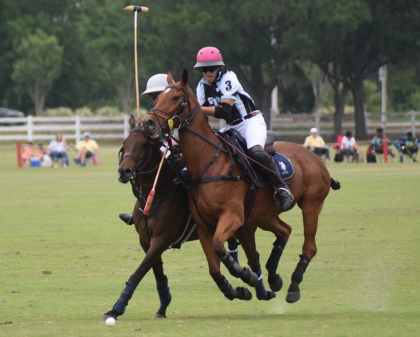 Ocala's Alyson Poor uses her horse to take Power Group's Kylie Sheehan out of the play.