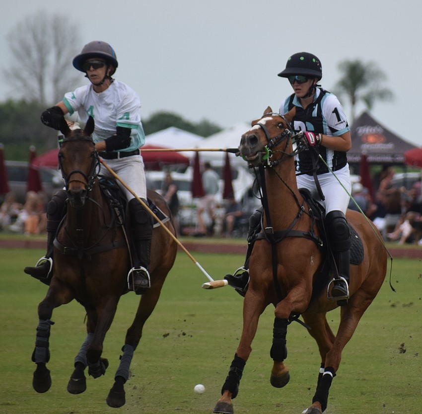 Cecelia Cochran of Power Group and Ocala's Ava Nunez try to pull up as they overrun the ball during the title match.