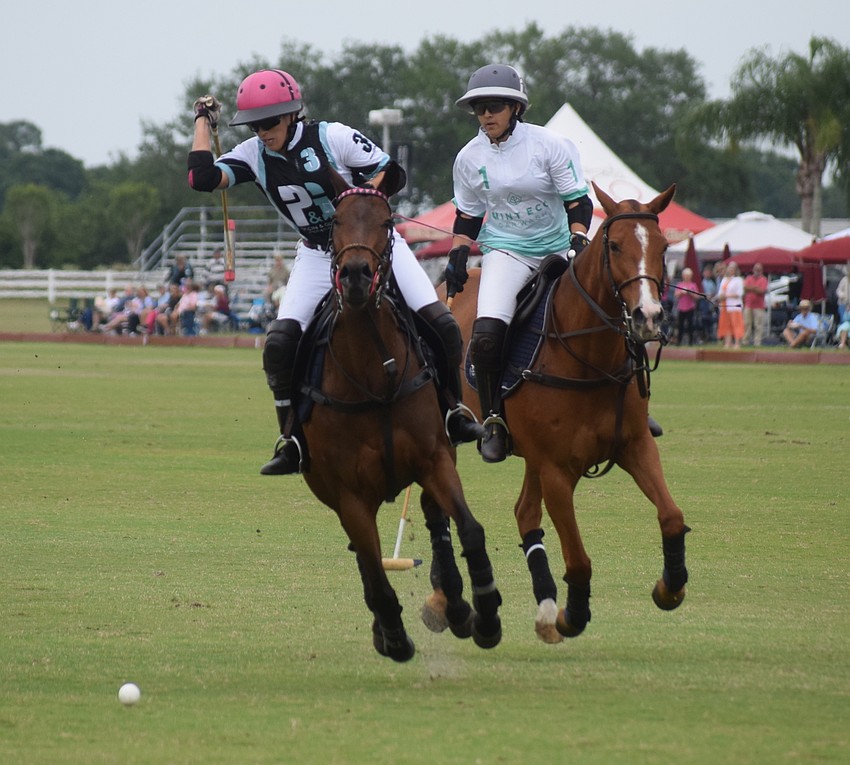 Ocala's Alyson Poor gets ready for a back shot while Power Group's Giuliana Tarazona chases.