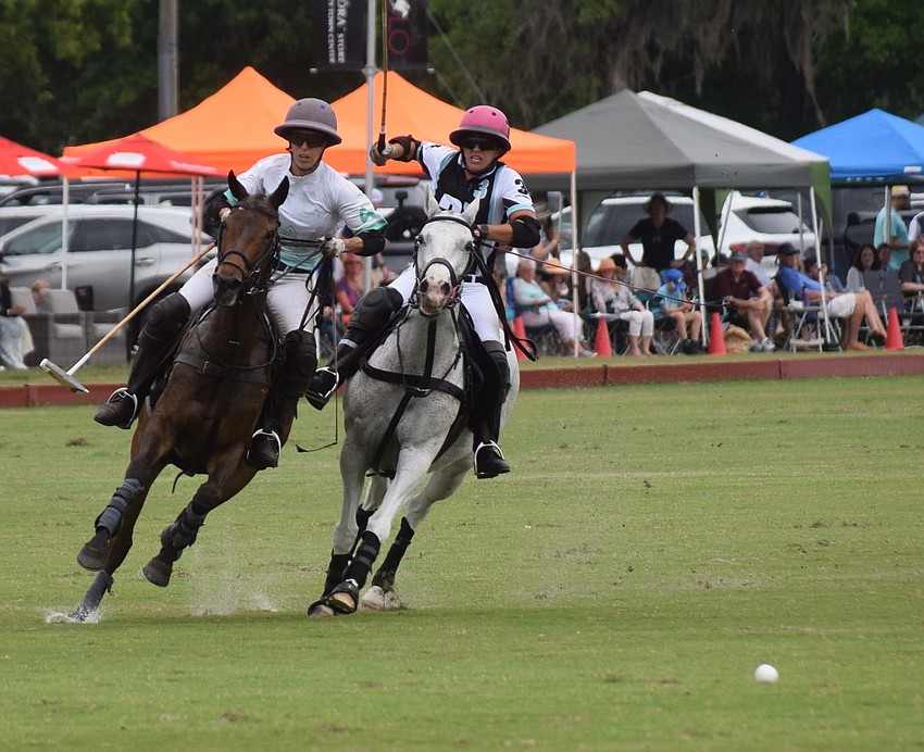 Power Group's Cecelia Cochran races Ocala's Alyson Poor to the ball.