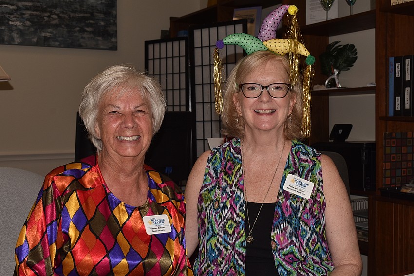 Barbara Koetzier and Mary Ann Brady welcomed guests in some foolish gear.