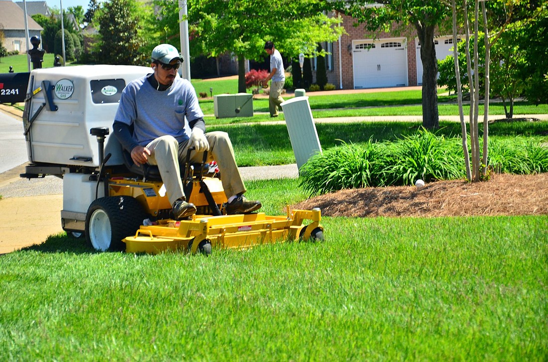 A Greenpal vendor completes lawn service. (Courtesy photo)