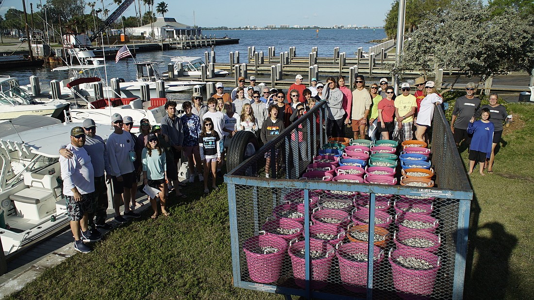 Sarasota Bay Watch members gathering before the release of clams on Saturday. (Photo courtesy of Ronda Ryan)