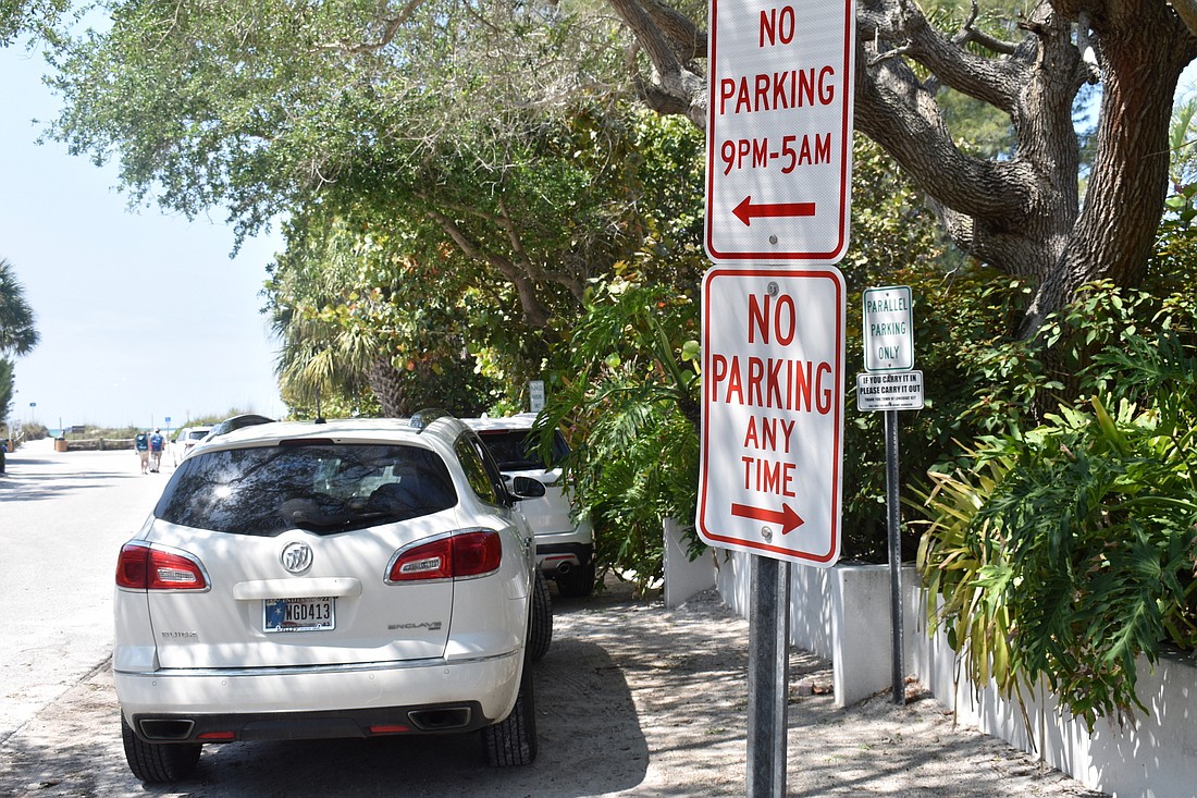 Parking along North Shore Road is tightly controlled by signs.