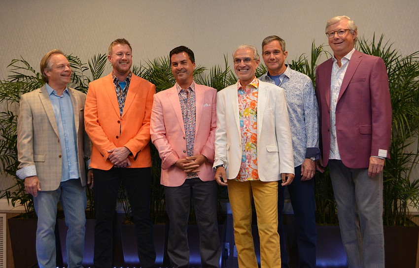 Runway models Todd Rippy, Michael O'Neil, Aaron Virgin, Calin Peters, Dave Odenath and Gary Ulrich