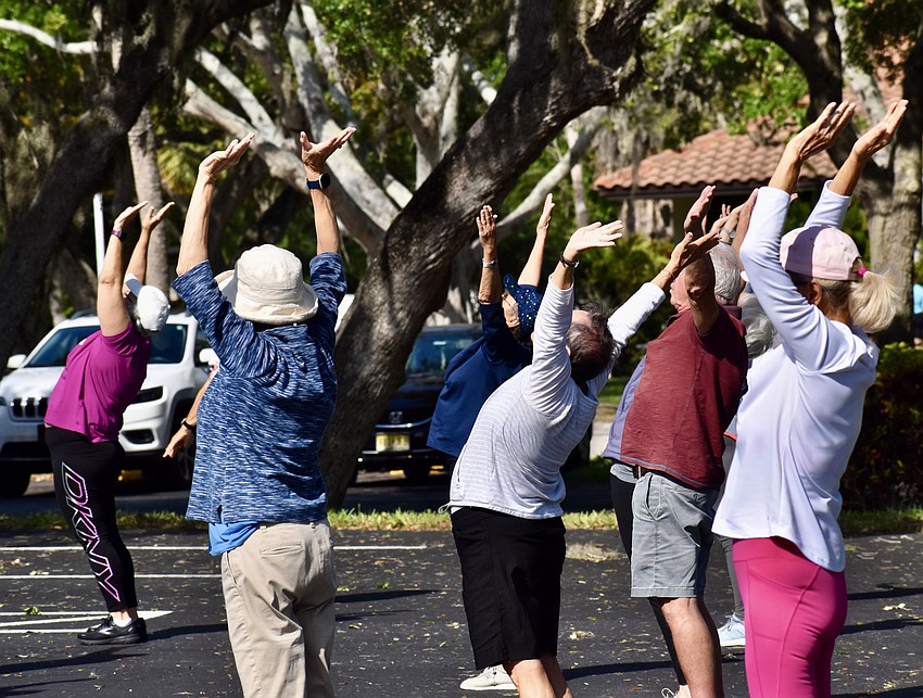 About 30 people turned out for the tai chi class led by Master Max Yan.