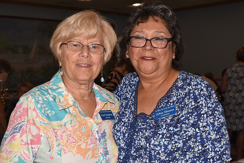 Carol Fischbein and JoAnn Sifuentes found their seats together.