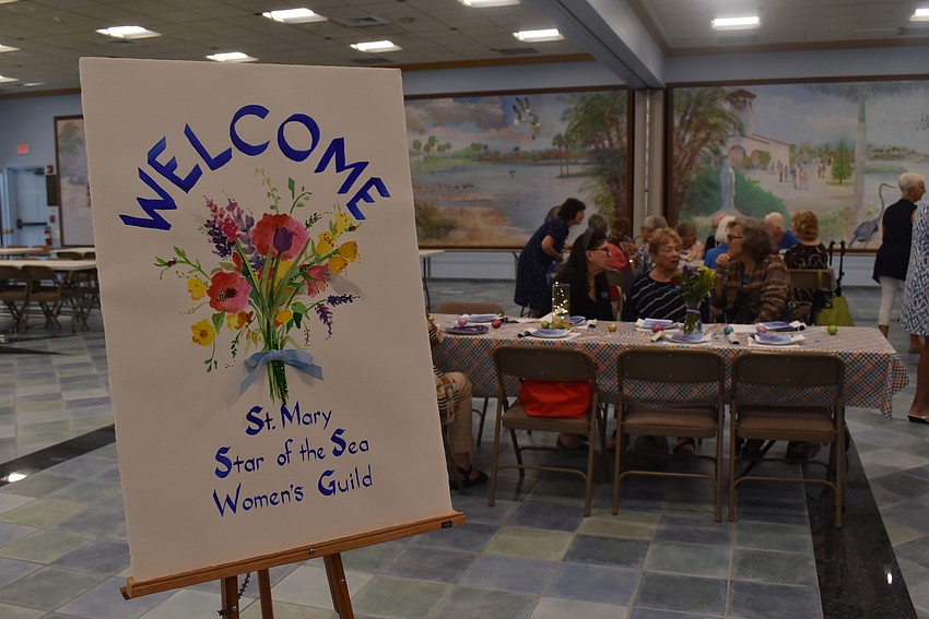 Members walked to the Father Pick Fellowship Hall for lunch.
