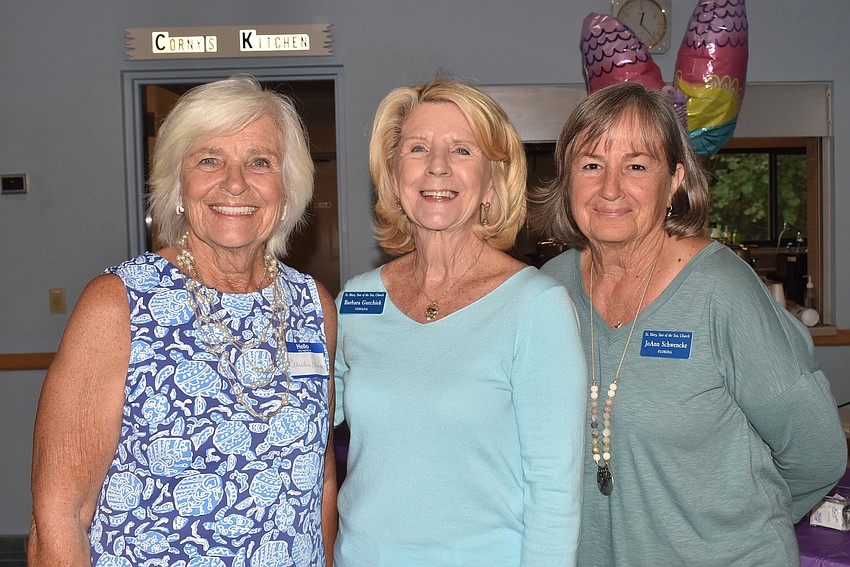 Claudia Hennigan, Barbara Gurchiek and Jo Ann Schwencke wait for lunch.