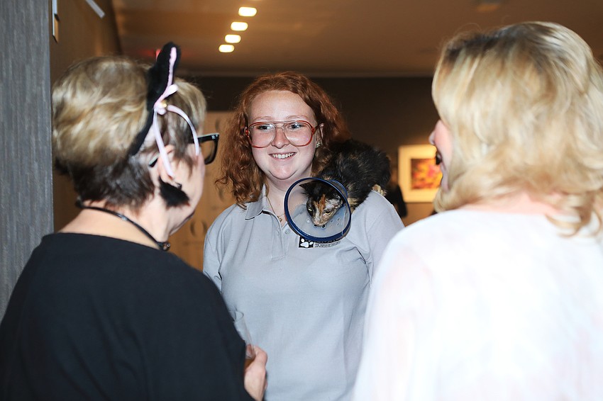 Kristina Cherry shows Sydney to audience members.