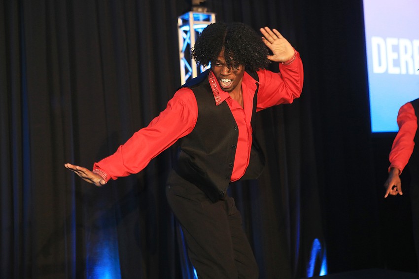 Dale Hill dances during the show.