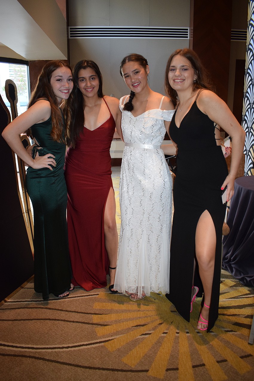 Juniors Sydney Sprague, Vanessa Richtfort, Tanner Sobecki-McMullen and Lauryn VanZandt love seeing all the decorations come together for the 