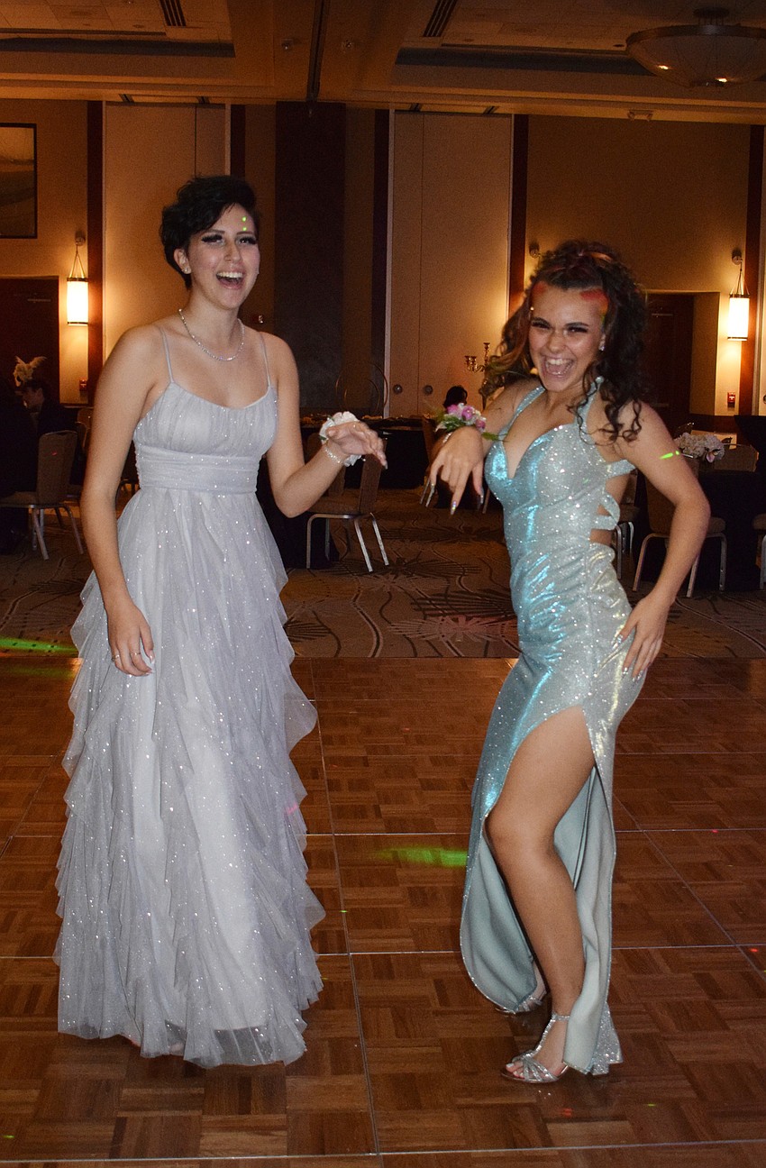 Junior Abigail McDonald and senior Mya Grant are the first to hit the dance floor.