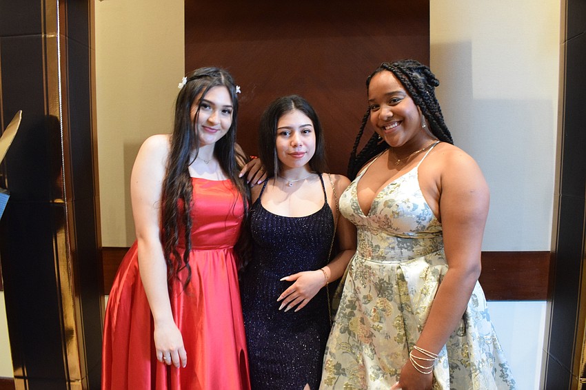 Senior Ana Garzon, sophomore Camila Munoz and senior Meysi Palacios are excited to be at prom.