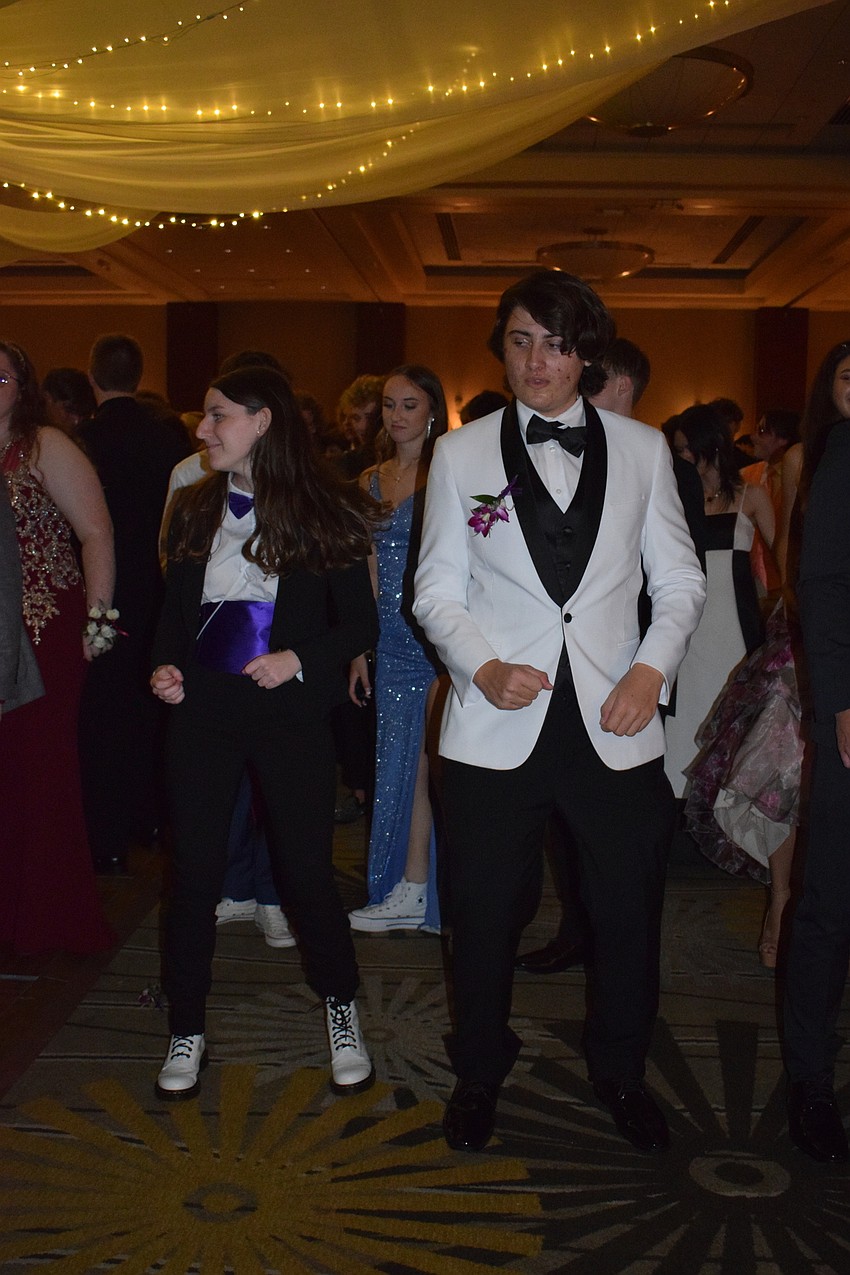 Emily Ellis and James Leveille dance to the 