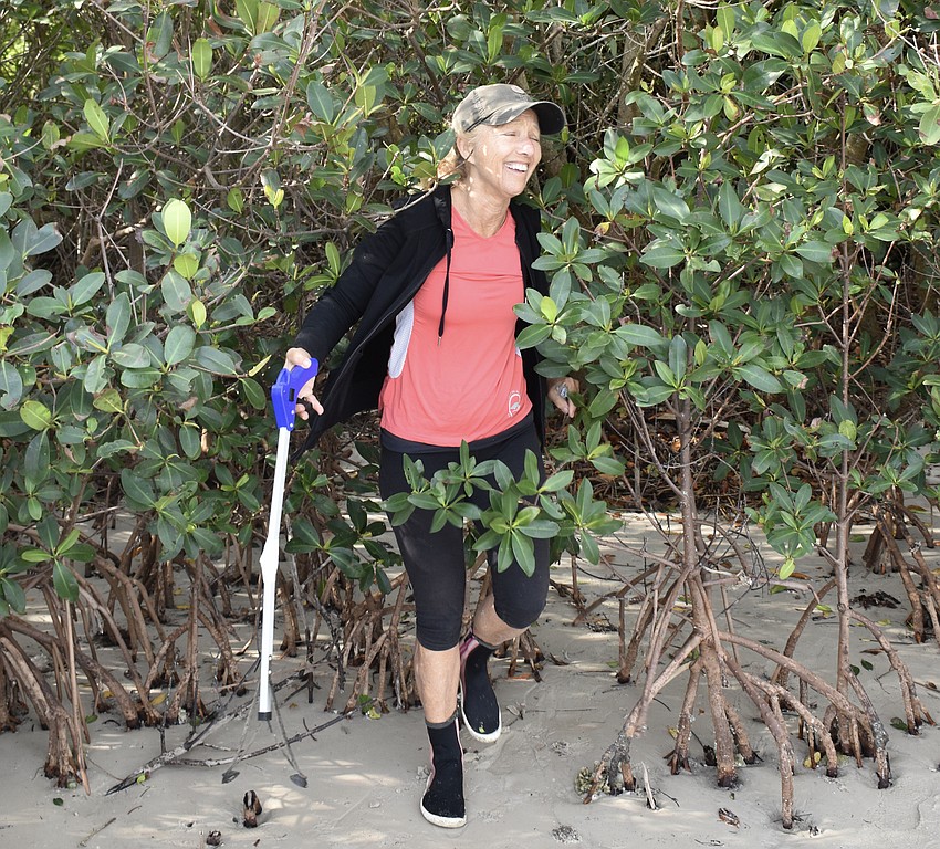Becky Parrish emerges from a thicket.