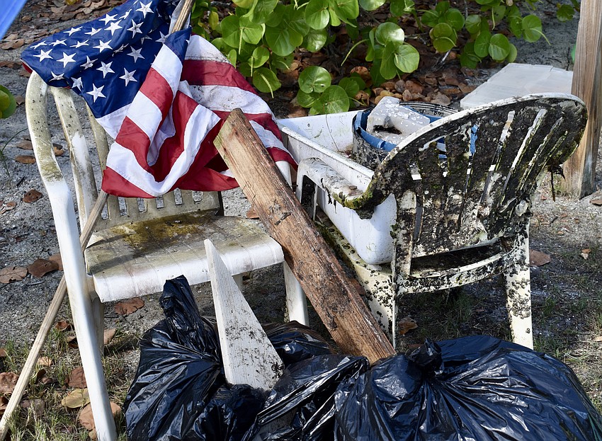Chairs and a tattered American flag were collected.