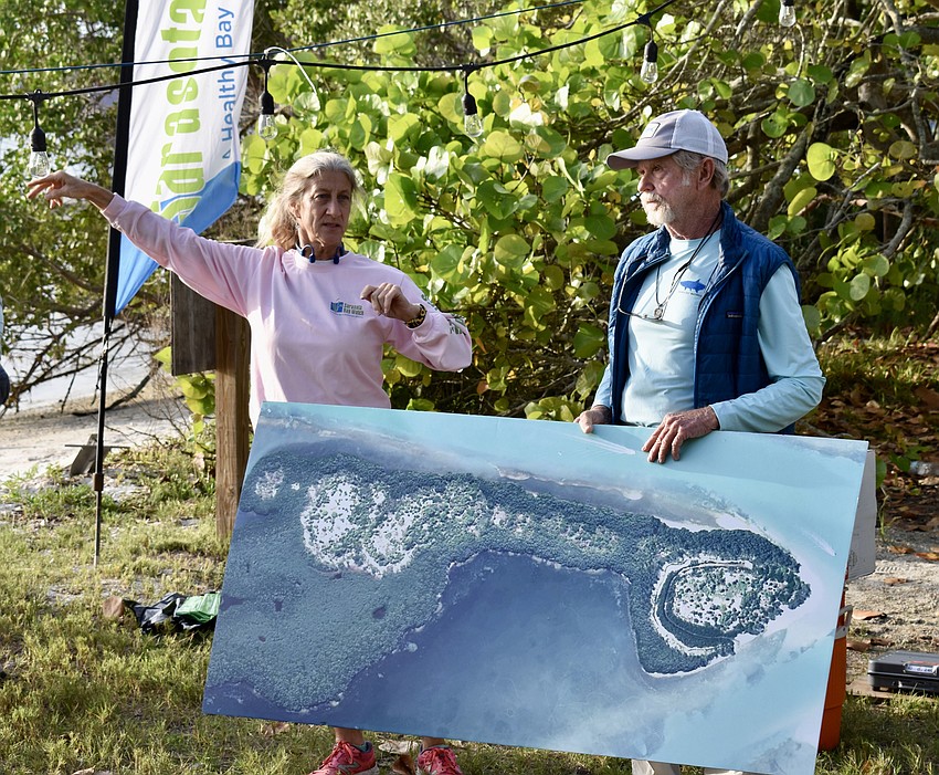 Ronda Ryan, president of Sarasota Bay Watch, and Rusty Chinnis talk about Sister Keys and where the volunteers would be working.