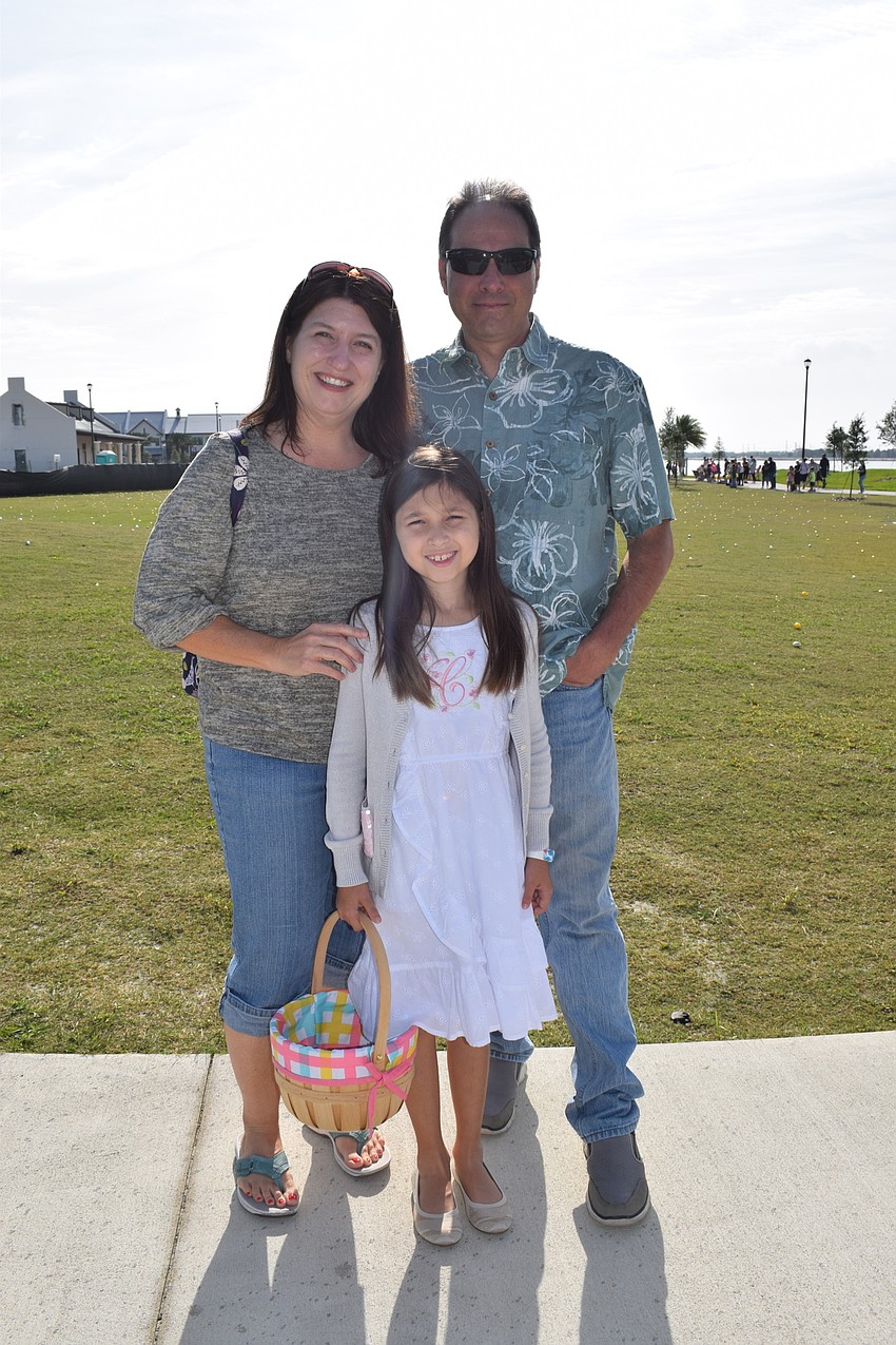 Greenbrook's Melanie and Scott Martin can't wait to watch their 8-year-old daughter Caroline Martin hunt for eggs.