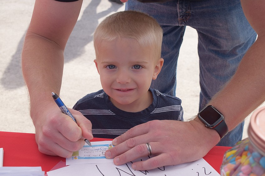 Lakewood Ranch's Robert Kamp, who is 3 years old, guesses how many jellybeans are in a jar. 