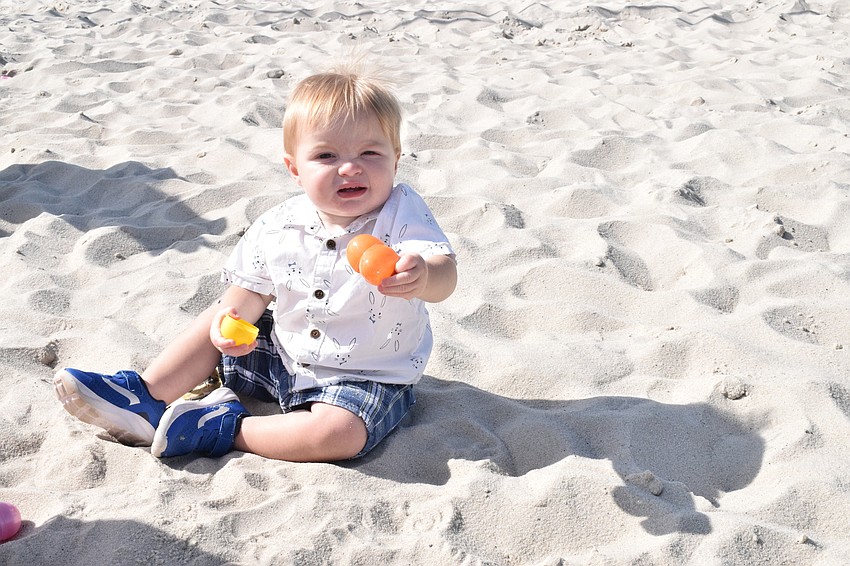 Lakewood Ranch's Cody Brown, who is 1, plays with eggs.